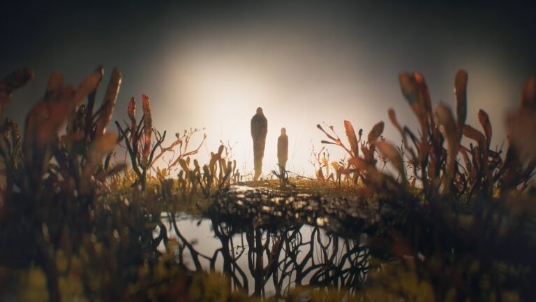 Silhouettes of Joel and Ellie walk through fungal overgrowth in the iconic title sequence of HBO’s The Last of Us series.