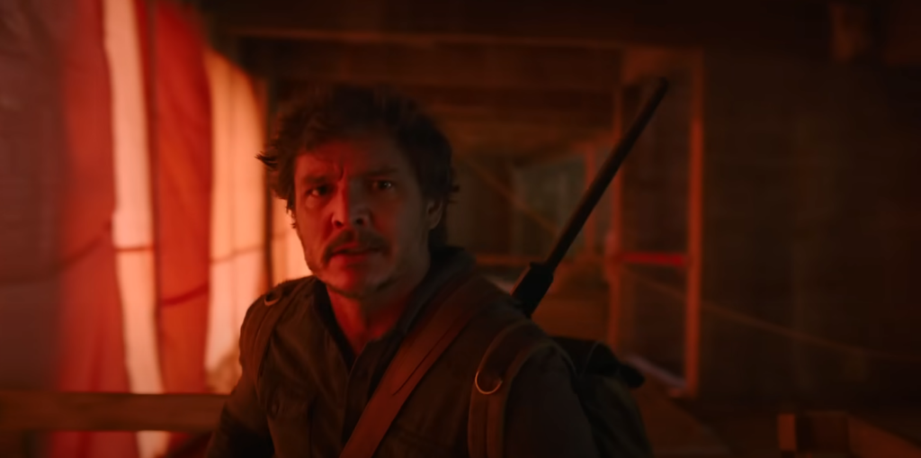 Joel moves through the Firefly hospital, tense and determined, during his rescue of Ellie in The Last of Us Episode 9 finale.