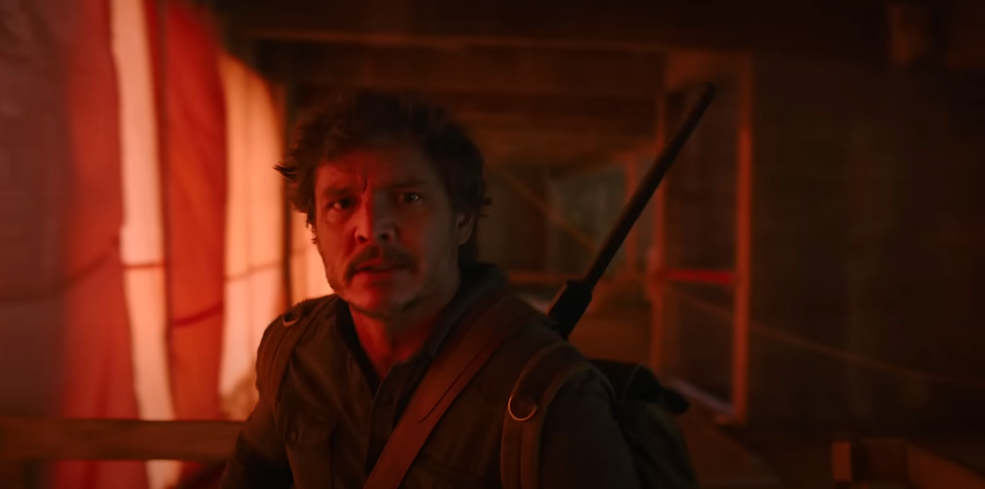 Joel moves through the Firefly hospital, tense and determined, during his rescue of Ellie in The Last of Us Episode 9 finale.