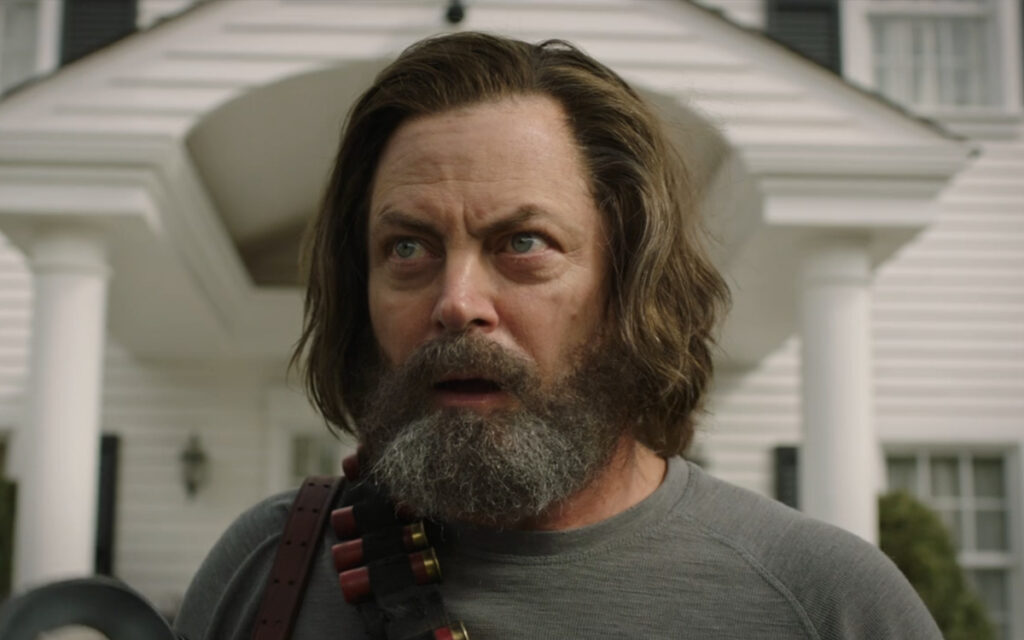 Nick Offerman as Bill stands alert outside his fortified home in The Last of Us Episode 3 on HBO.